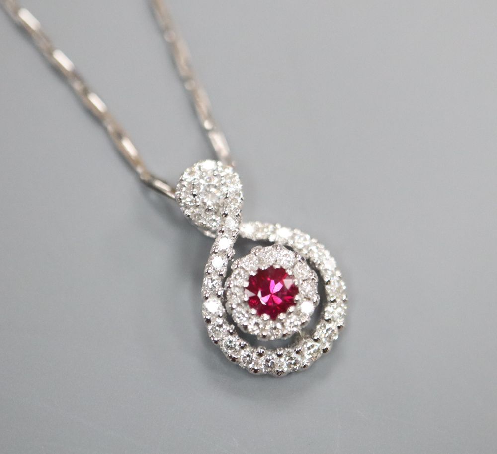 A diamond and ruby 18ct white gold pendant